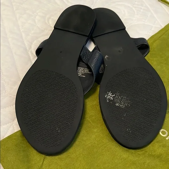 Tory Burch Black Flip Flops with Gold Emblem - Picture 2 of 2